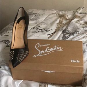 Black red bottoms with silver spikes no knock off